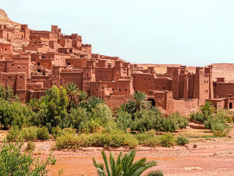 The earthen kasbah of Aït Ben Haddou above its palm grove